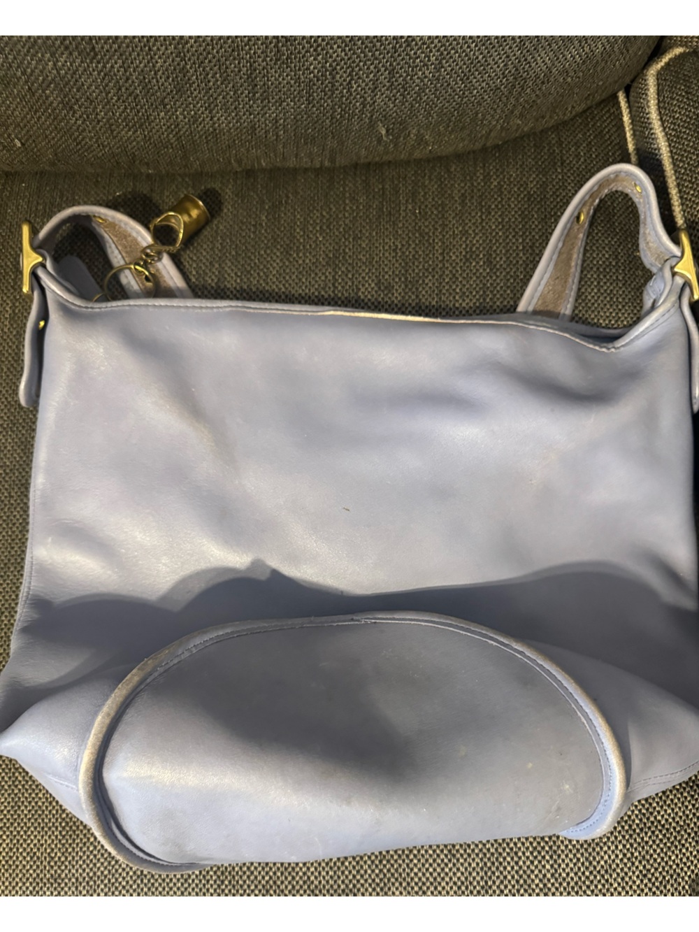 Periwinkle coach bag with vintage charm